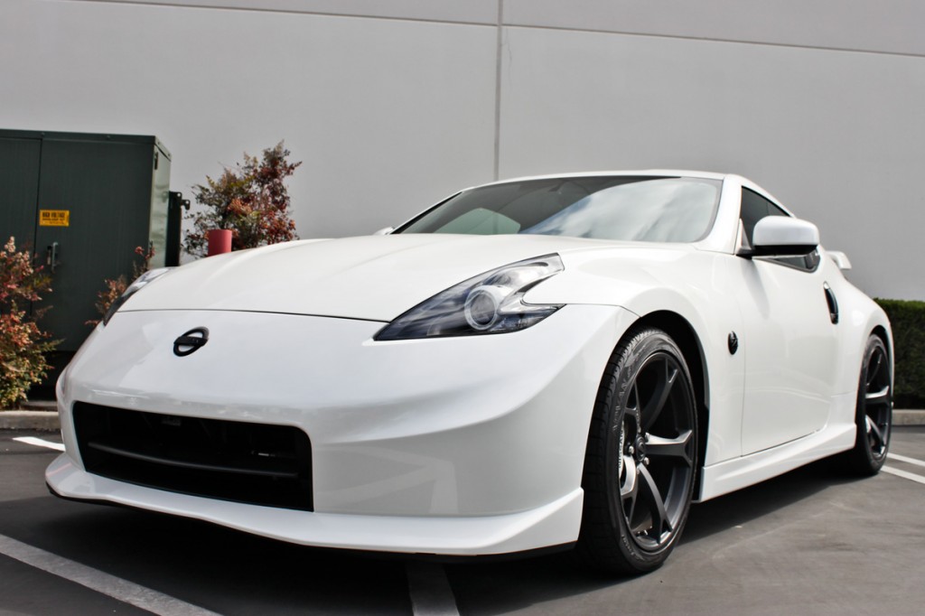 white Nisaan 370Z nismo supercharged
