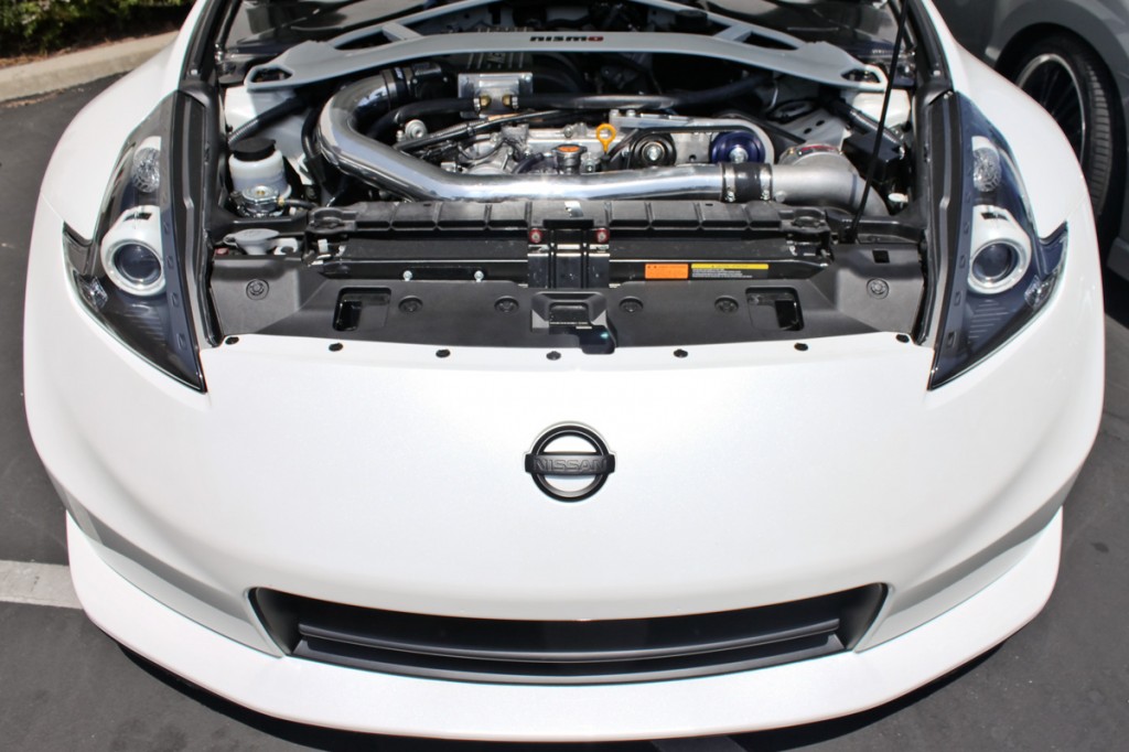 supercharged white 370z nismo front view