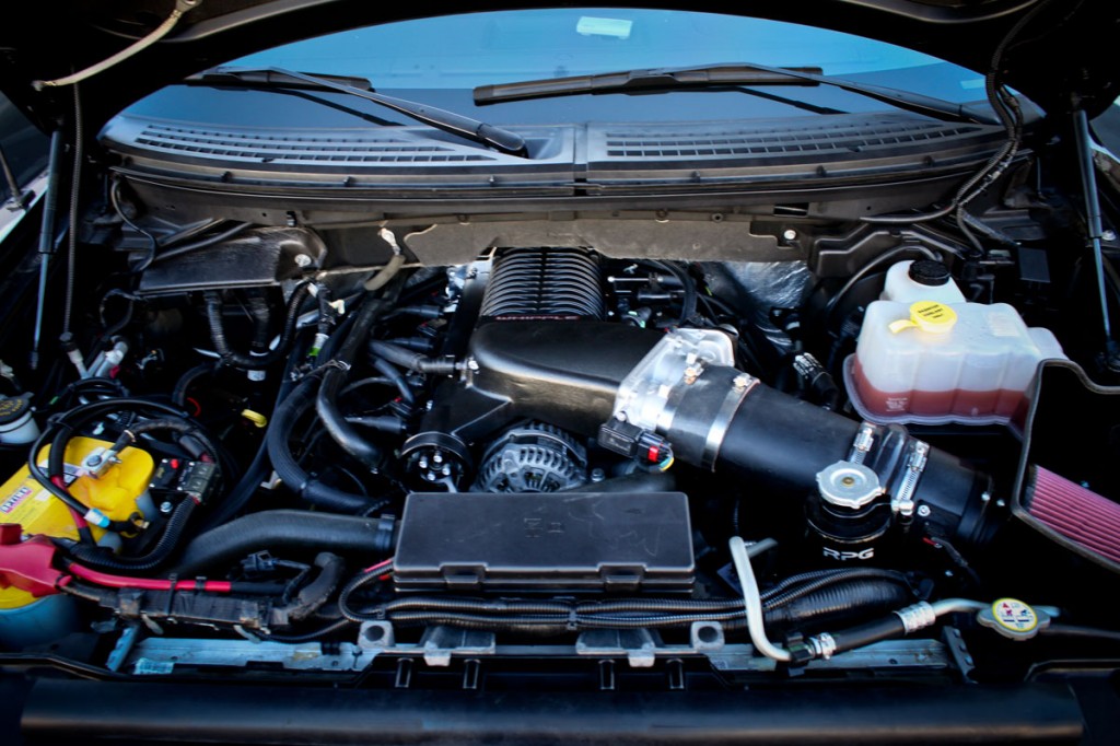 Ford Raptor Supercharger engine bay with whipple installed at Stillen