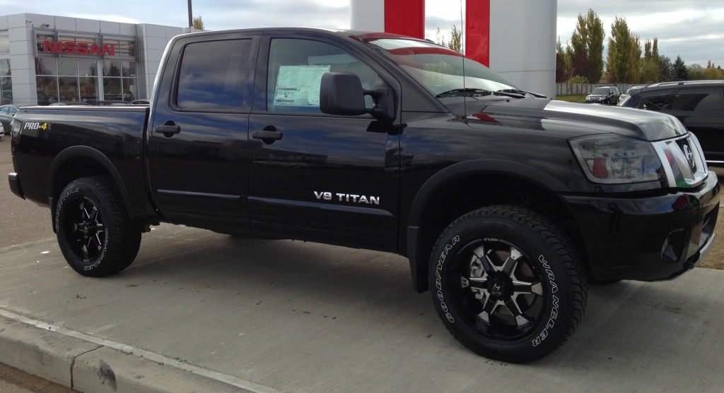 Sitllen Nissan Titan Truck Side shot