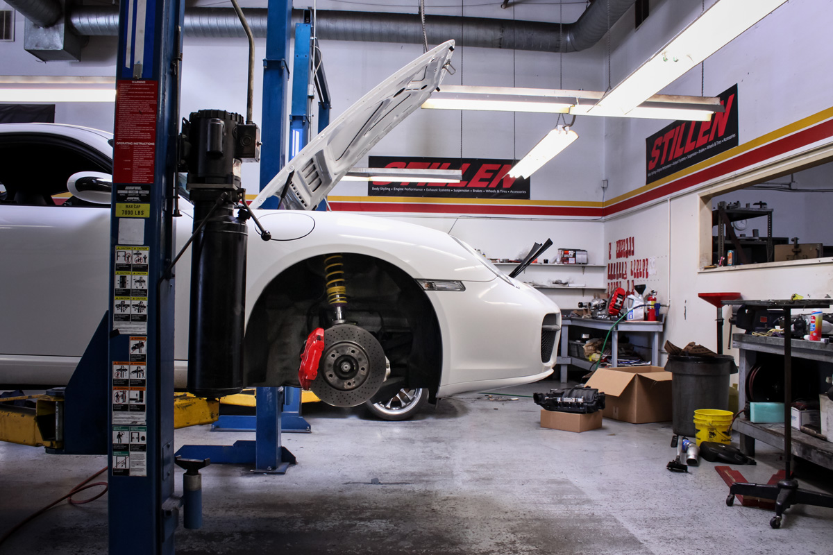 Porsche Cayman at the STILLEN Performance Shop Getting KW Coilovers Installed